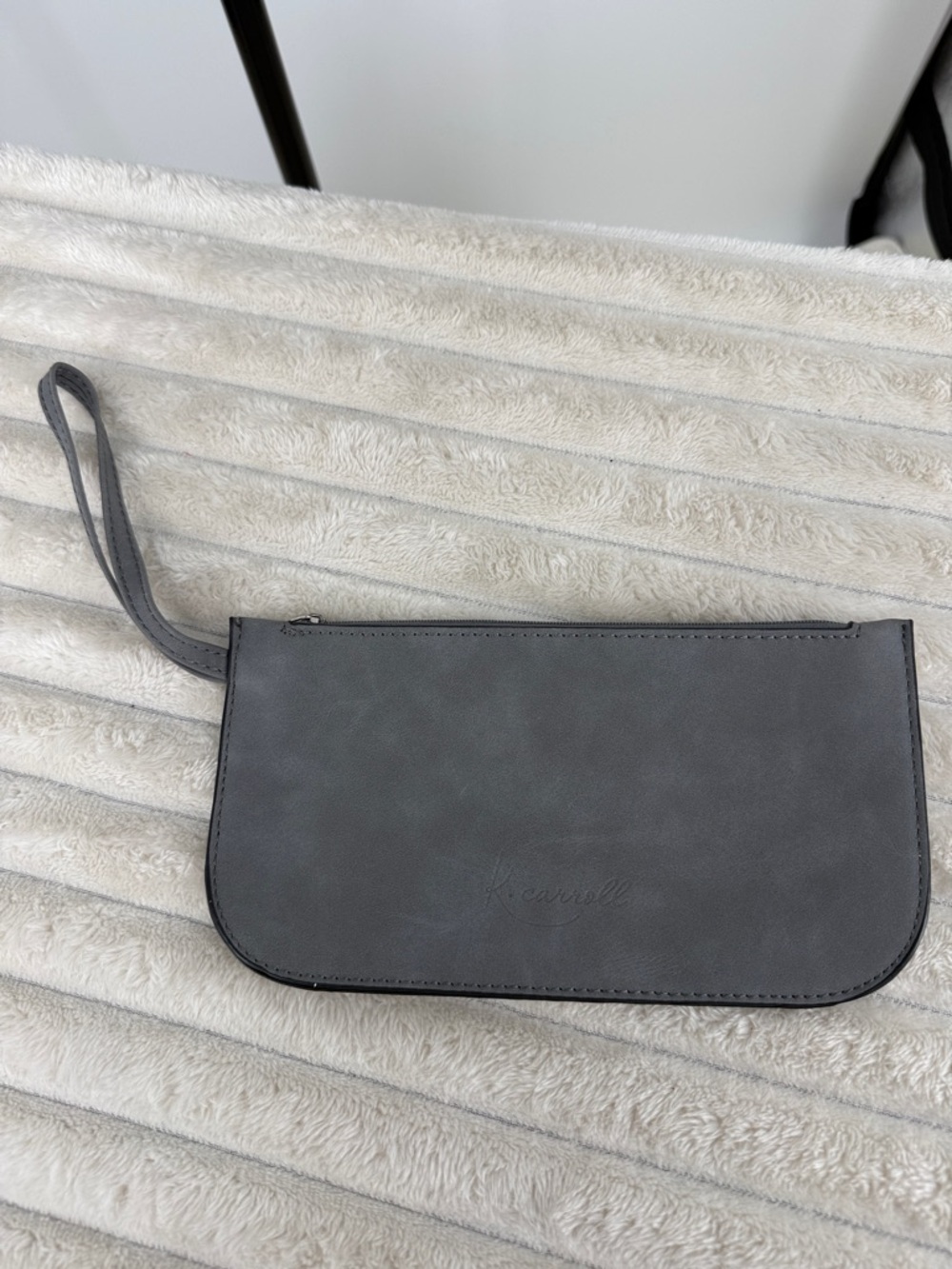 K. Carroll faux suede wristlet